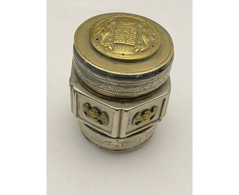 A Chinese silver and bronze circular box decorated with bats and dragons