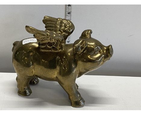A ceramic flying pig