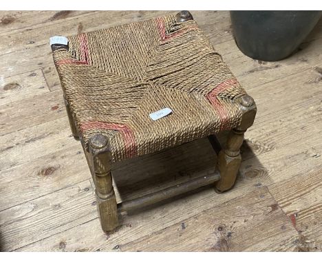 A vintage rush work four legged stool. 30cm tal. No shipping