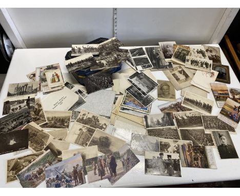 A box of assorted  WW1 period postcards, photographs etc