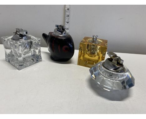 Four vintage table lighters, shipping unavailable