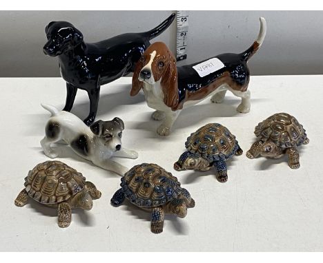 A selection of assorted figurines including Beswick and Wade, shipping unavailable