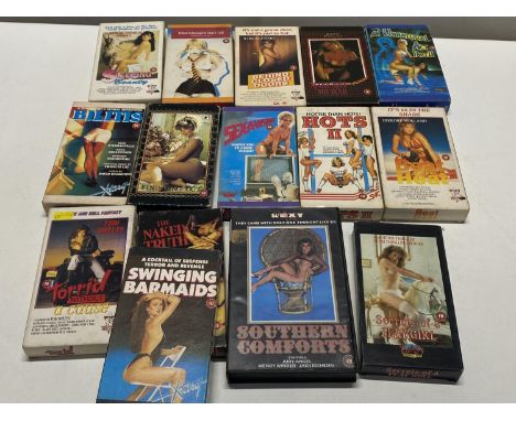 A box full of vintage adult videos
