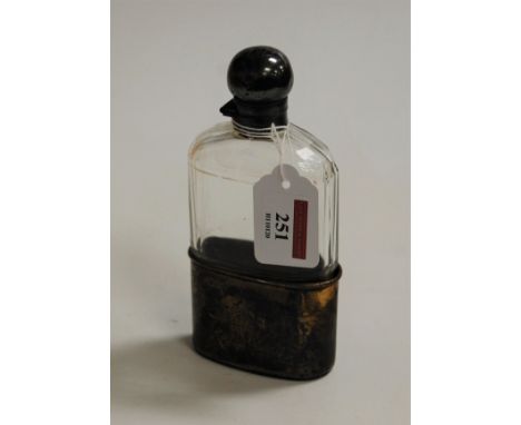 A Victorian faceted glass and silver topped hip flask, h.16cm