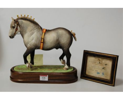 A Royal Worcester model of a Percheron stallion, modelled by Doris Lindner, on wooden stand, No.165/500, with supporting cert