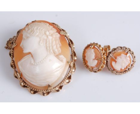 A carved shell cameo brooch depicting profile portrait of a maiden, in 9ct gold ropetwist mount with safety chain, 4 x 3cm; t