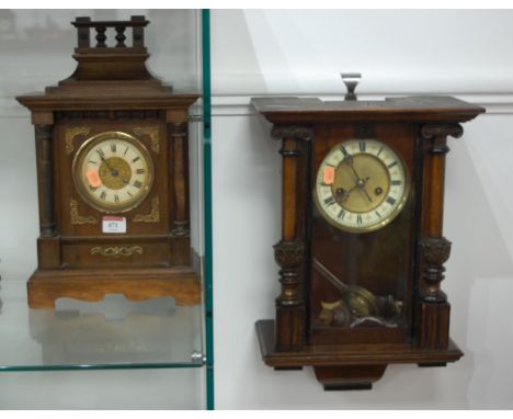 A late 19th century continental beech cased wall clock having enamelled chapter ring with Roman numerals and 8-day movement t