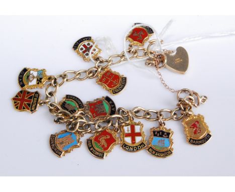 A 9ct gold curblink bracelet containing a collection of 9ct gold and enamel set charms, being coats of arms of British towns,