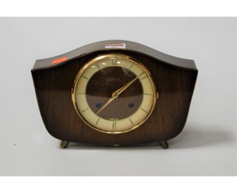 A 1950s Hermle walnut cased mantel clock