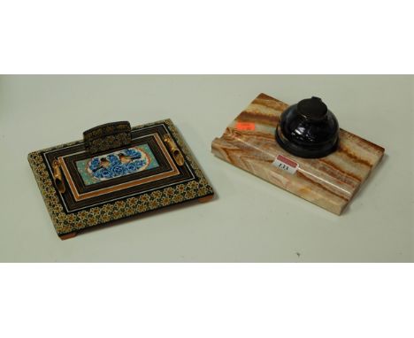 A veined marble desk stand, having single glass inset inkwell, w.18cm; together with a Middle Eastern tourist example (2)
