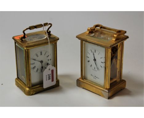 A modern lacquered brass carriage clock, retailed by Thomas Braithwaite of London; together with an early 20th century French