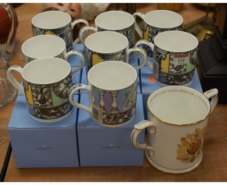A set of eight Wedgwood boxed china coffee mugs together with a Royal Worcester Royal Marriage loving cup No. 779/1000
