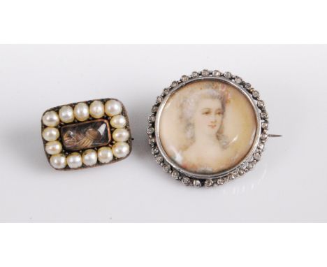 A 19th century seed pearl set mourning brooch, being yellow metal backed, 14mm; together with a white metal portrait brooch d