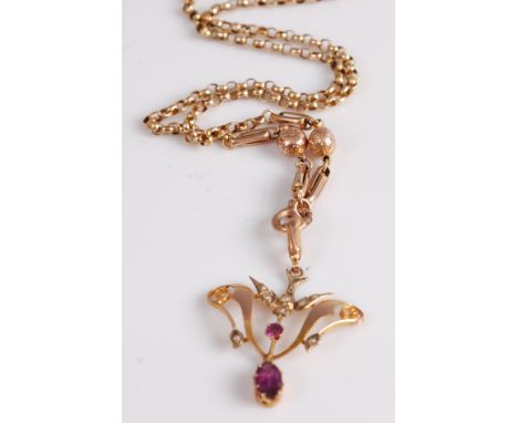 An Edwardian 9ct gold, amethyst and seed pearl set openwork pendant, 38mm, on 9ct gold belcher link neck chain, gross weight 