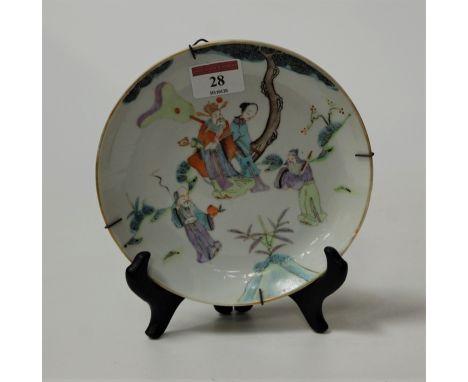 A Chinese famille rose enamel decorated small dish, dia.26.5cm.Very slightly rubbed.Large firing imperfection to the reverse.