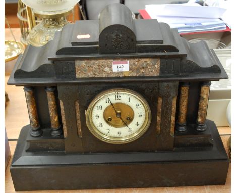 A late Victorian slate mantel clock of architectural outline having eight day movement striking on a gong, height 38.5cm