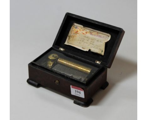 A French walnut cased travelling music box, the 3" cylinder playing four airs, case width 15cm.Not currently in working order