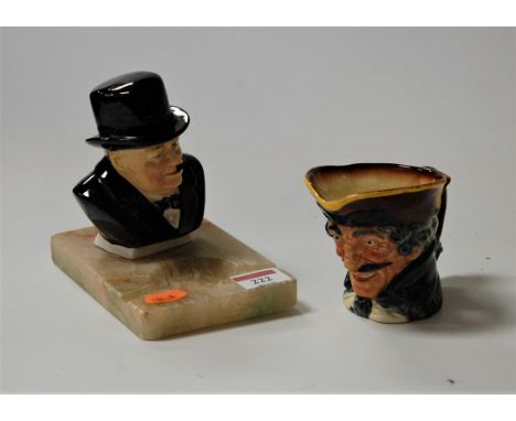 A Royal Doulton character jug of Dick Turpin, printed mark verso (restored to rim); together with an onyx ashtray surmounted 