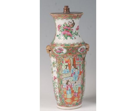 A late 19th century Chinese Canton enamel decorated stoneware vase, having twin gilt decorated lion mask ringed mouldings, th
