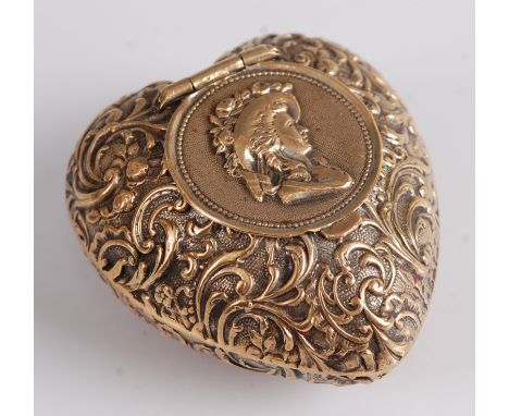 A continental silver gilt and embossed heart shaped snuff-box, the hinged cover decorated in relief with profile portrait of 