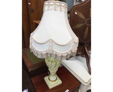 An ornate table lamp. 