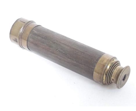 A brass three drawer telescope. 