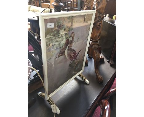 A vintage folding fire screen/table with print after Vernon Ward. 