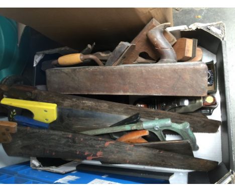A box of various tools to include planes, saws, etc. 