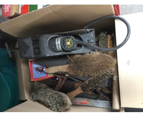 A box of tools to include foot pump, brushes, tool kits, etc. 
