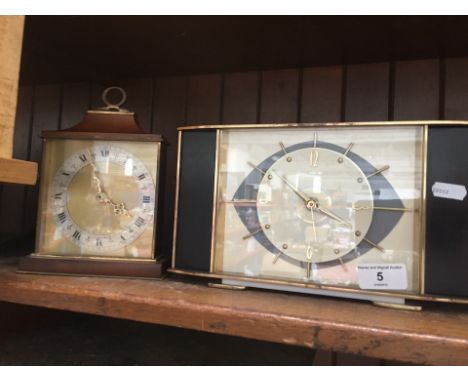 A Metamec table clock in Art Deco design and a Smiths Tempora clock. 