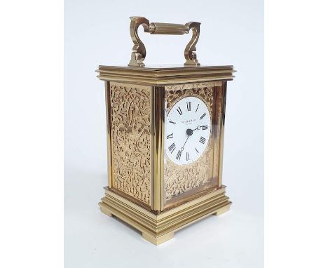 A brass carriage clock, the dial inscribed 'Taylor &amp; Bligh England', height 18cm. 