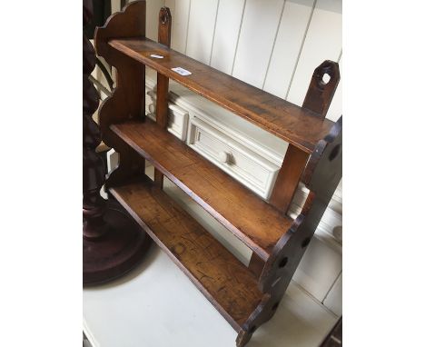 An Edwardian wall shelf. 