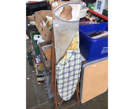 A vintage wooden ironing board. 