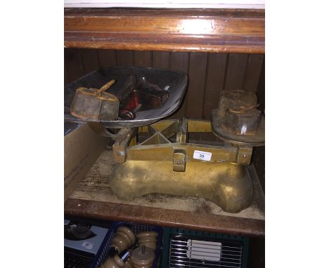 A cast iron set of scales with tray and weights and a mini vice. 