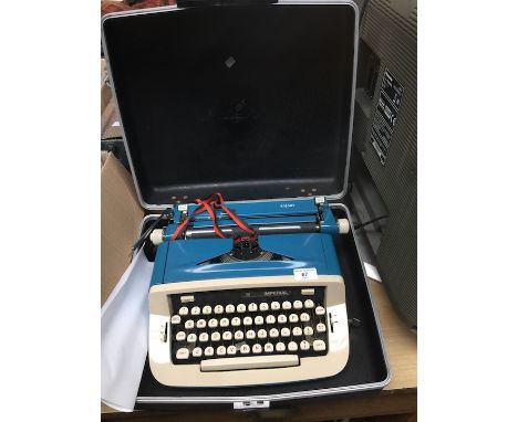 A cased portable vintage Imperial Safari typewriter 