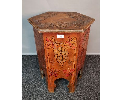 Antique hand painted side table [in the style of liberty], the hexagonal top lifts to interior storage lined with purple upho