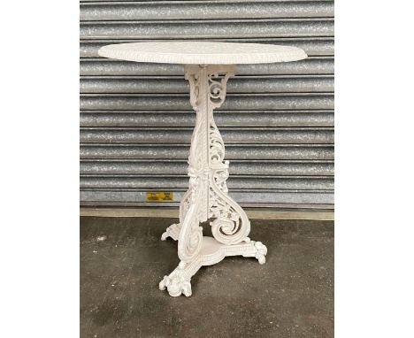 19th century cast iron garden table, the pierced circular top, raised on a scrolling tripod base cast with flowers and scroll