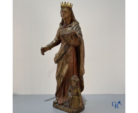 Religious objects: A wood-sculpted and polychrome representation of Saint Catherine of Alexandria and Emperor Maxentius. 17th