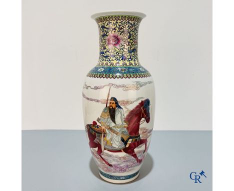 Asian Art, A finely decorated Chinese vase with a warrior on a horseback and calligraphy. Marked. 20th century. | Height: 46 