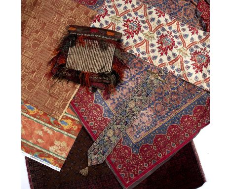 An Afghan saddlebag with banded decoration and flat weave back, 94 x 47cm, an old Belouch rug, an Indian cotton table clock a