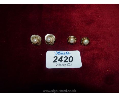 Two pairs of pearl earrings one pair set in silver the other 9ct gold.