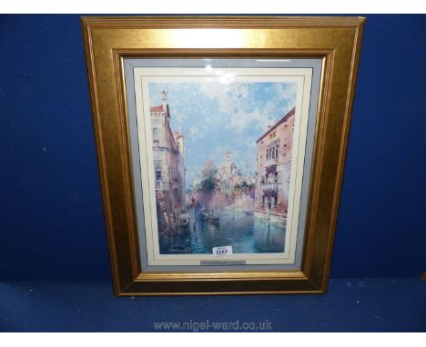 A gilt framed print by Rio San Bernardo.
