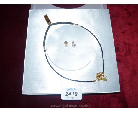 A Couer de Lion necklace and ear-ring set.