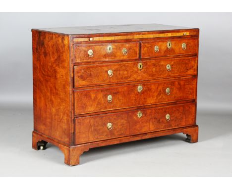 A George I burr walnut chest of oak-lined drawers, the feather banded caddy top above a brushing slide, height 83cm, width 10