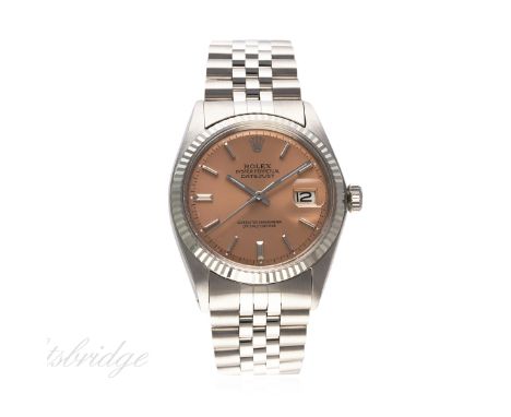 A GENTLEMAN'S STEEL & WHITE GOLD ROLEX OYSTER PERPETUAL DATEJUST BRACELET WATCH CIRCA 1972, REF. 1601
D Salmon pink dial with