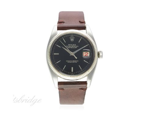 A RARE GENTLEMAN'S STEEL & WHITE GOLD ROLEX OYSTER PERPETUAL DATEJUST WRIST WATCH CIRCA 1954, REF. 6305 1
D: Gloss black dial
