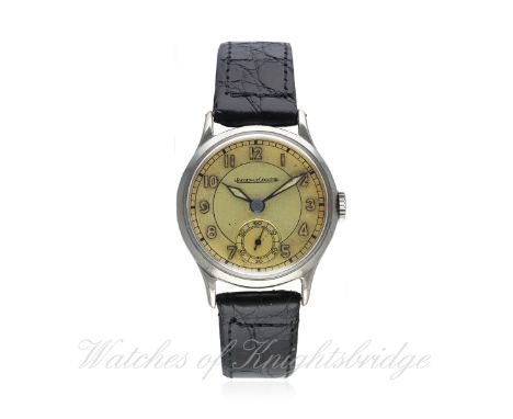 A GENTLEMAN'S STAINLESS STEEL JAEGER LECOULTRE WRIST WATCH CIRCA 1940s
D: Two tone dial with luminous Arabic numerals & hands