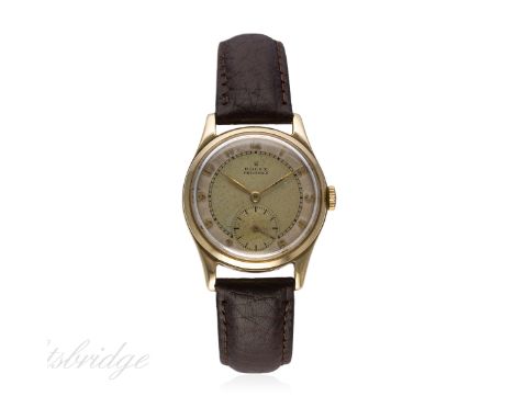 A GENTLEMAN'S 9CT SOLID GOLD ROLEX PRECISION WRIST WATCH CIRCA 1950s
D: Silver dial with raised gilt Arabic numerals, inner m