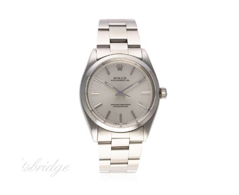 A GENTLEMAN'S STAINLESS STEEL ROLEX OYSTER PERPETUAL BRACELET WATCH CIRCA 1959, REF. 1002 WITH ROLEX BOX
D: Silver dial with 