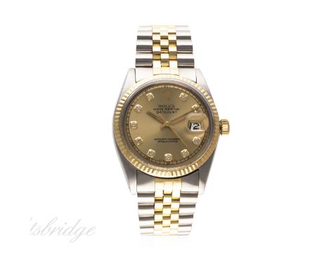 A GENTLEMAN'S STEEL & GOLD ROLEX OYSTER PERPETUAL DATEJUST BRACELET WATCH CIRCA 1964, REF. 1601
D: Champagne dial with diamon